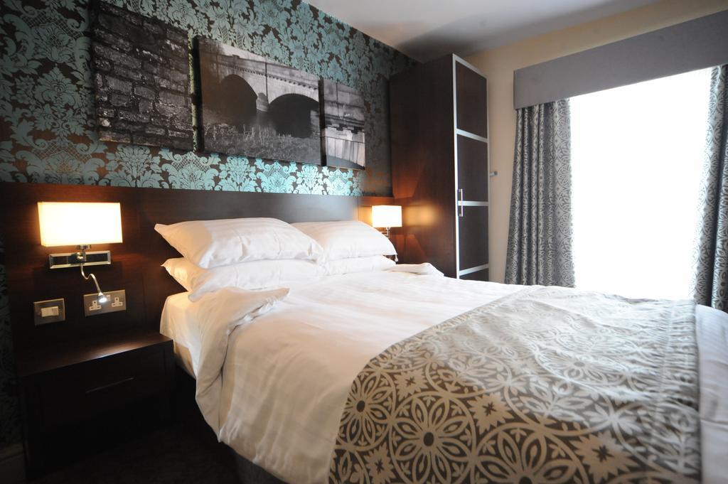 The Bull Hotel Стоуні-Стратфорд Номер фото